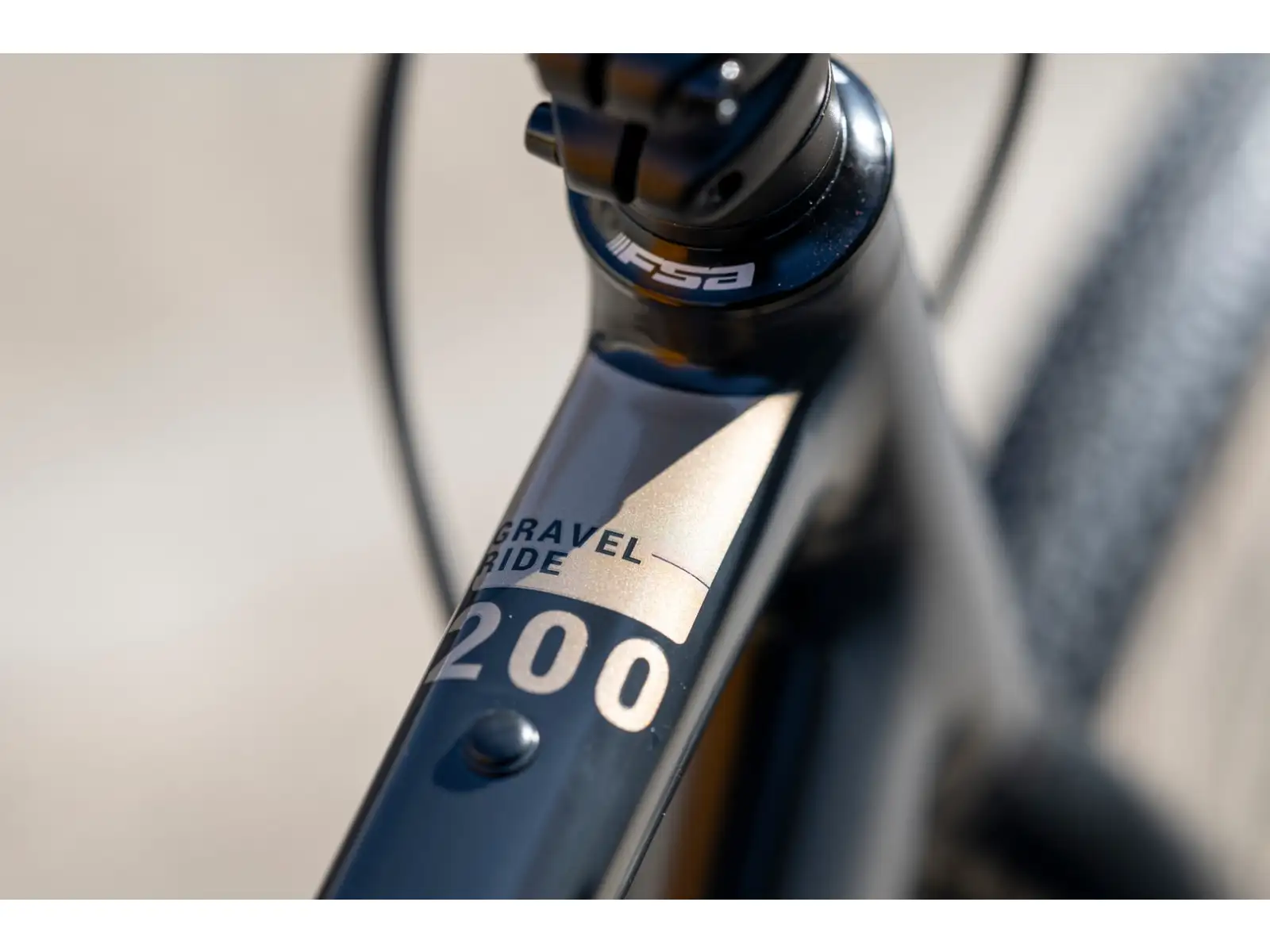 Rock Machine Gravelride 200 gravel kolo Gloss Black/Sand