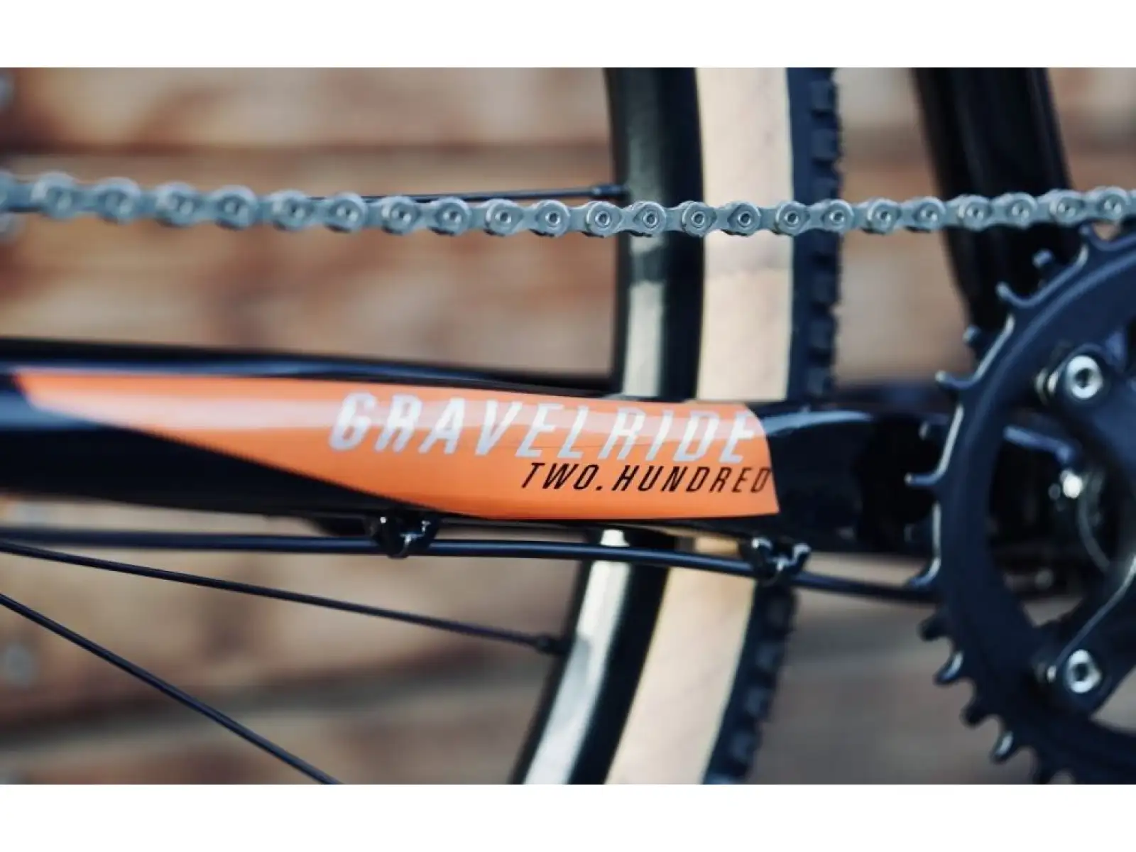 Rock Machine Gravelride 200 gravel bicykel Gloss Black/Brick Orange/Silver