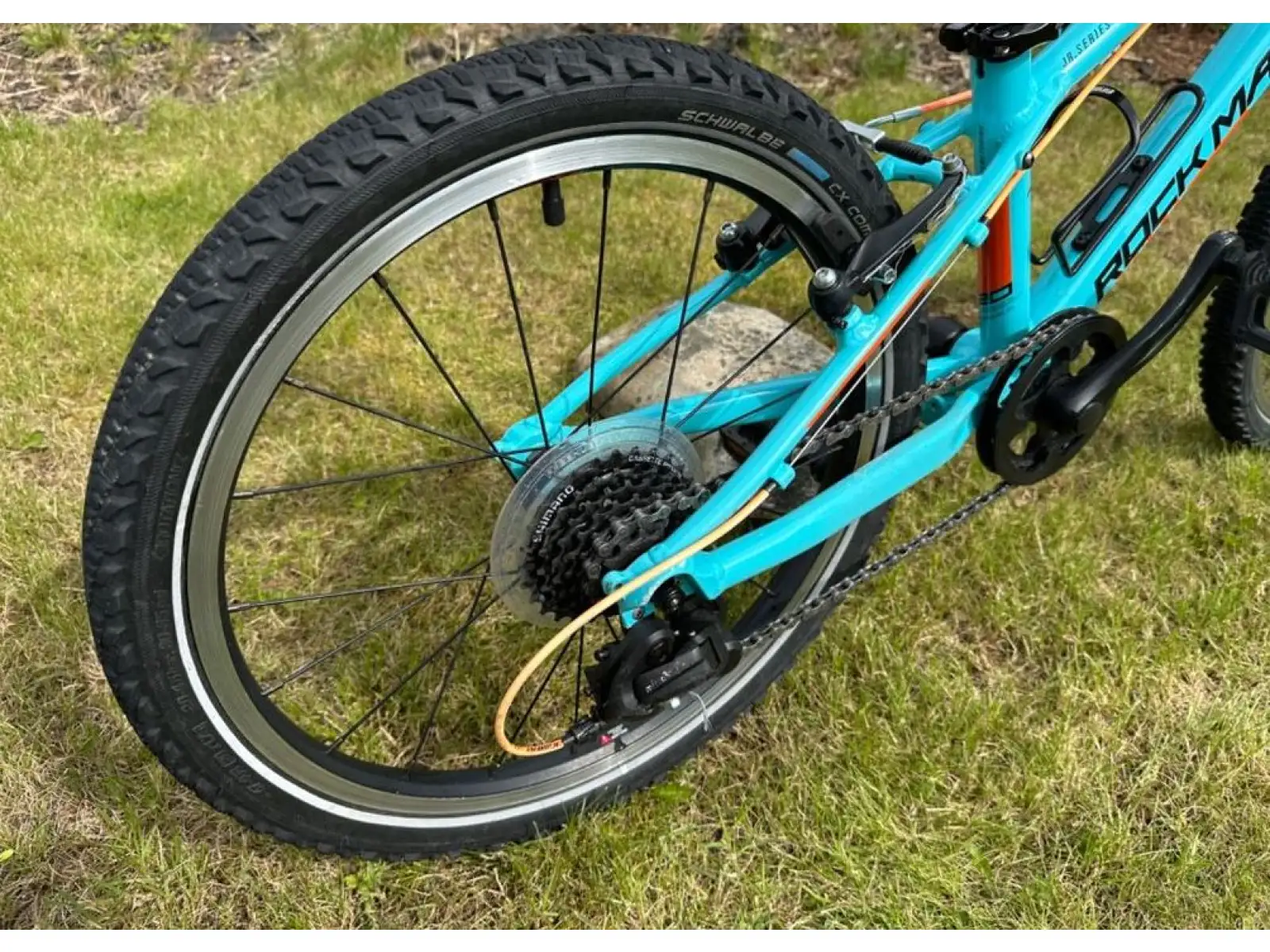 Rock Machine Thunder 20 Gloss Neon Cyan/Black/Orange detský bicykel
