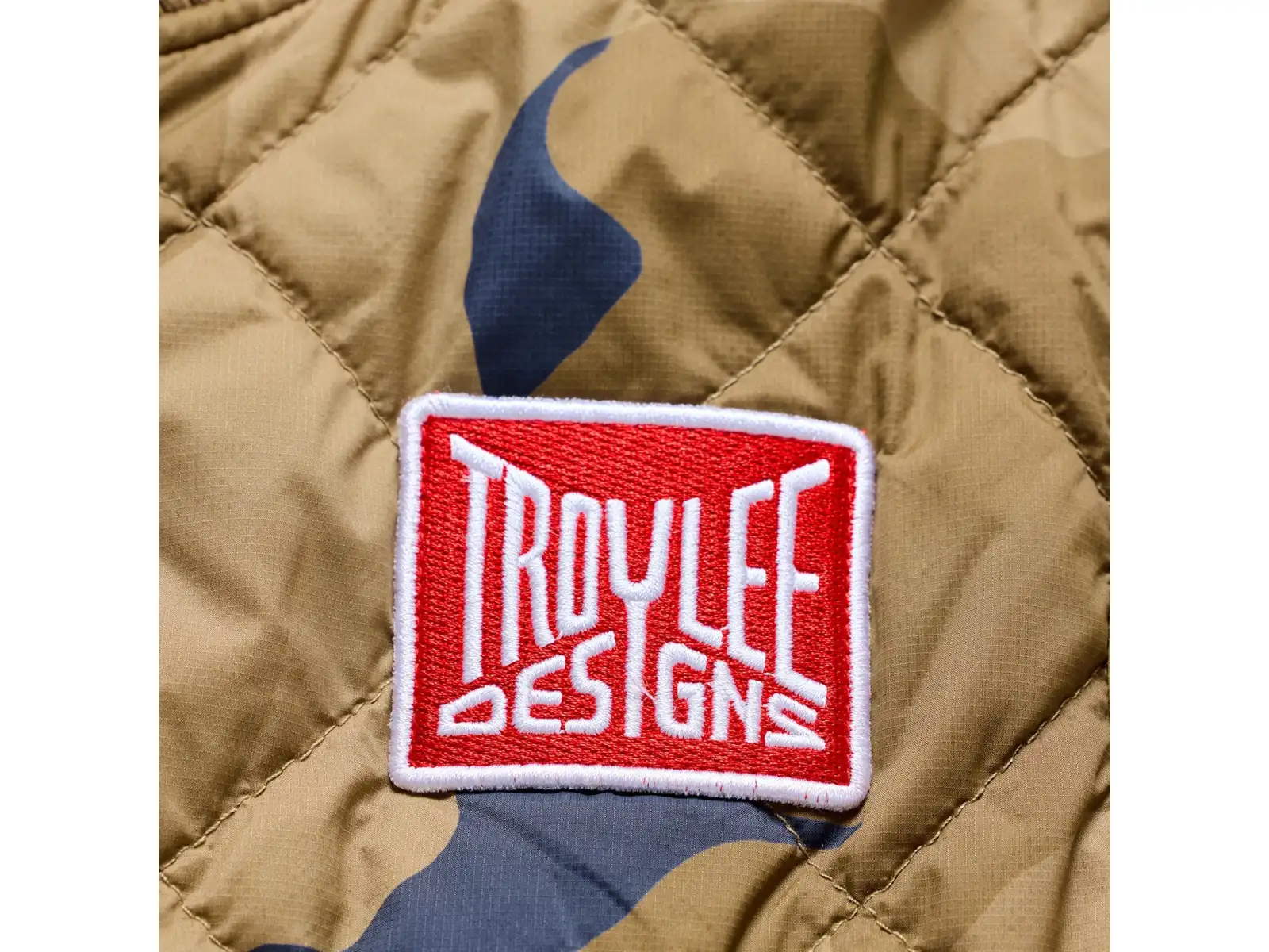 Troy Lee Designs Ruckus Ride pánska vesta Camo Sienna