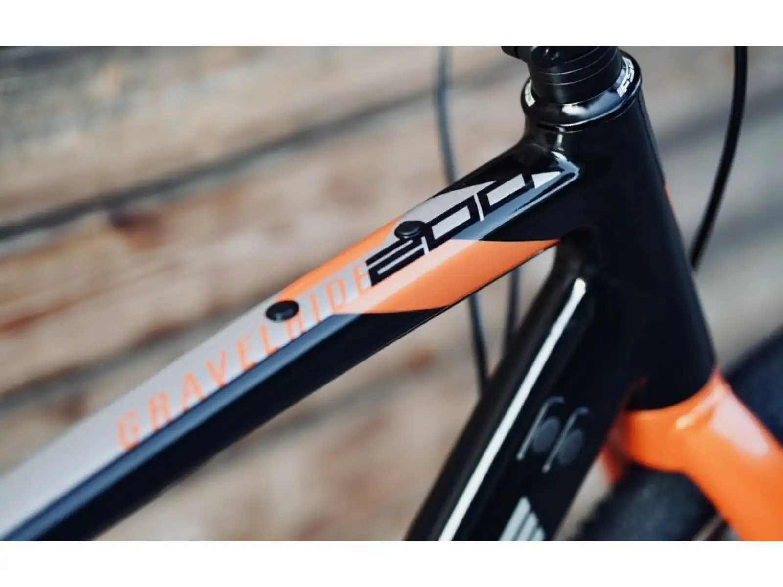 Rock Machine Gravelride 200 gravel bicykel Gloss Black/Brick Orange/Silver